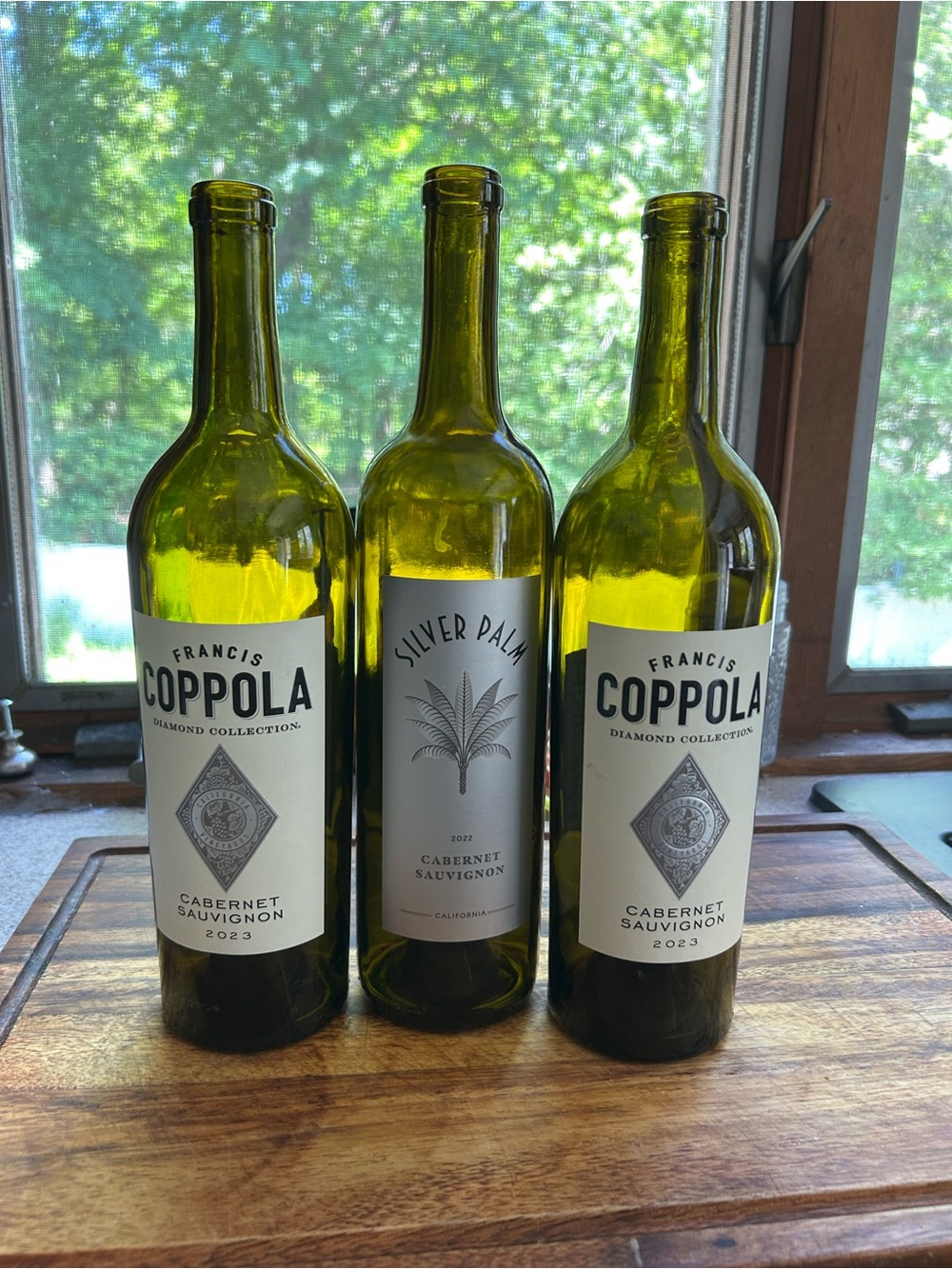 Green empty wine bottles
